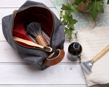 Load image into Gallery viewer, open waxed canvas dopp kit with toiletries 
